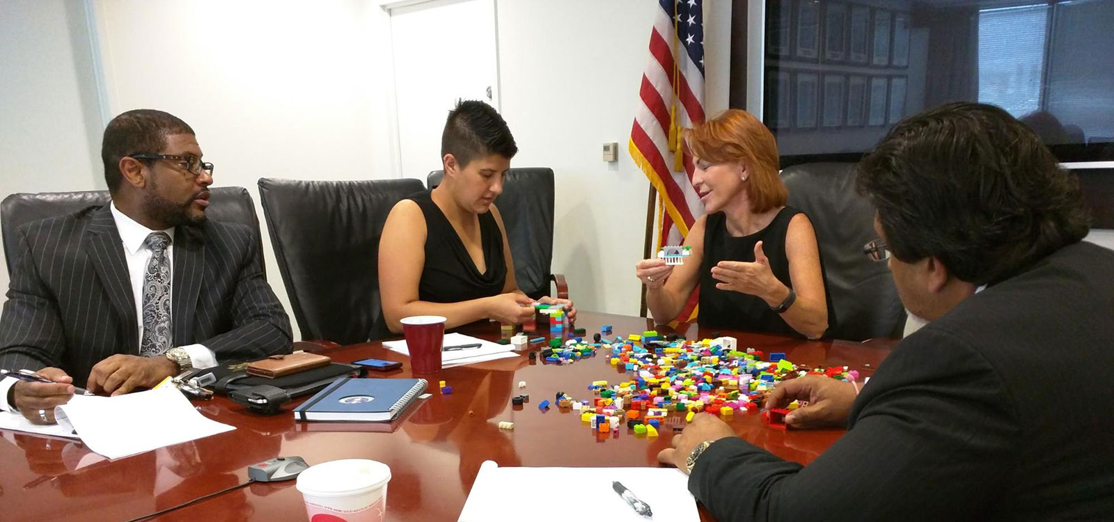 SBA executives prepare to build with Legos.
