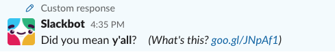 Screenshot of the legacy Slackbot response. It says, Did you mean y'all? and includes a link to learn more about the response.